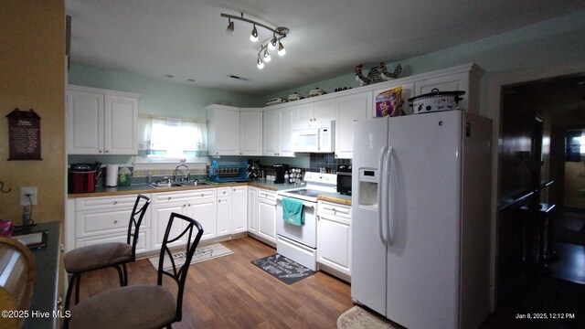 living room featuring ceiling fan and light wood-type flooring