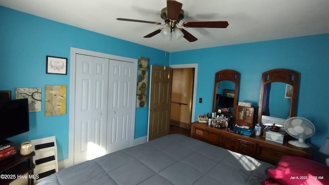 bedroom featuring a closet and ceiling fan