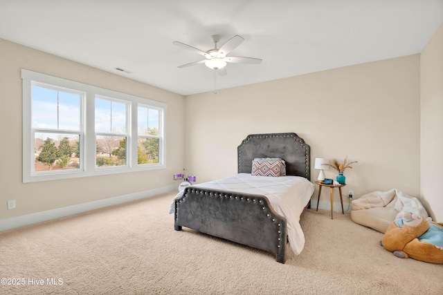 bedroom with ceiling fan and carpet flooring