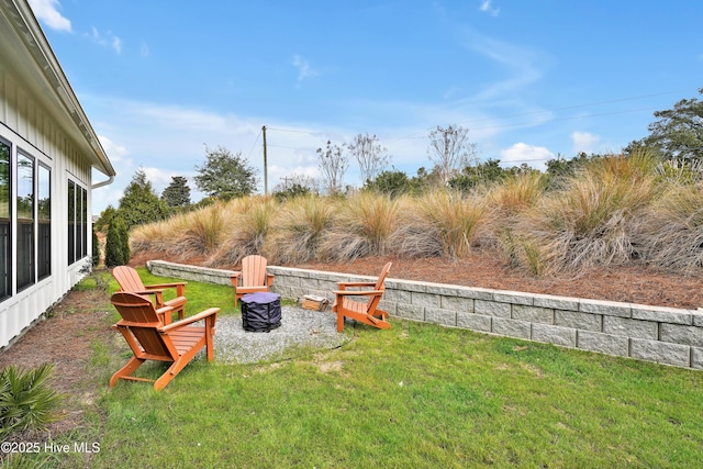 view of yard featuring a fire pit