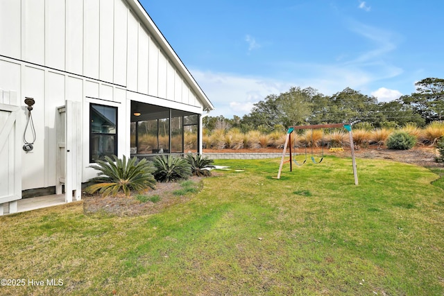 view of yard featuring a sunroom