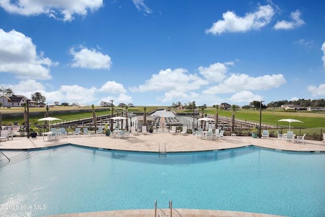 view of pool featuring a patio