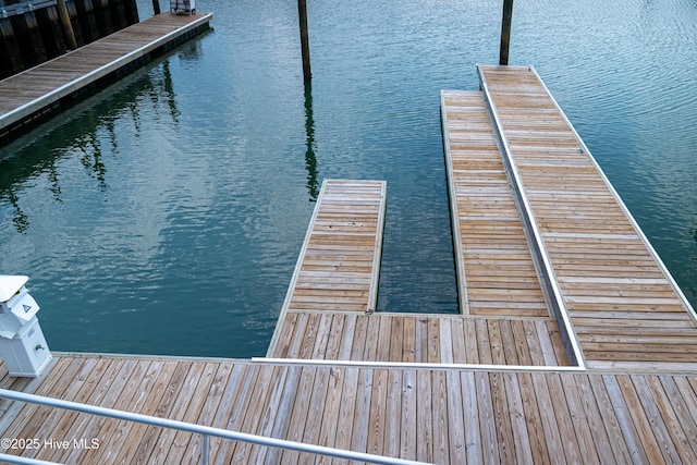 dock area featuring a water view