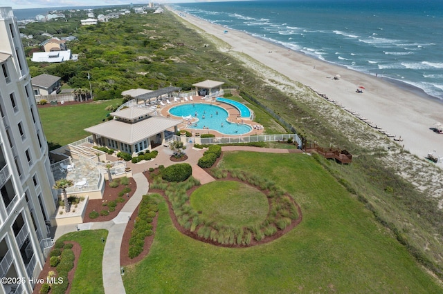 bird's eye view featuring a beach view and a water view