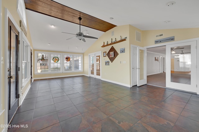 interior space featuring french doors and lofted ceiling