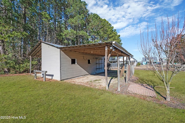 view of outdoor structure with a lawn