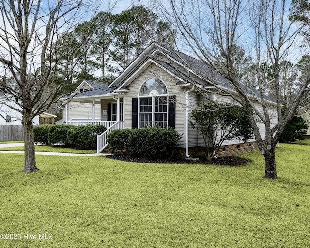 view of front facade with a porch and a front lawn