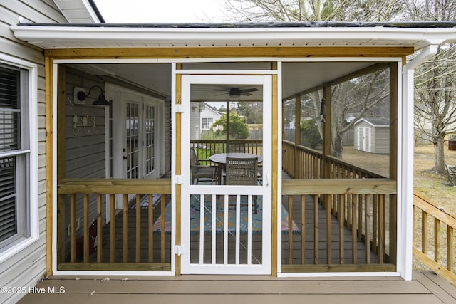 wooden terrace with a sunroom