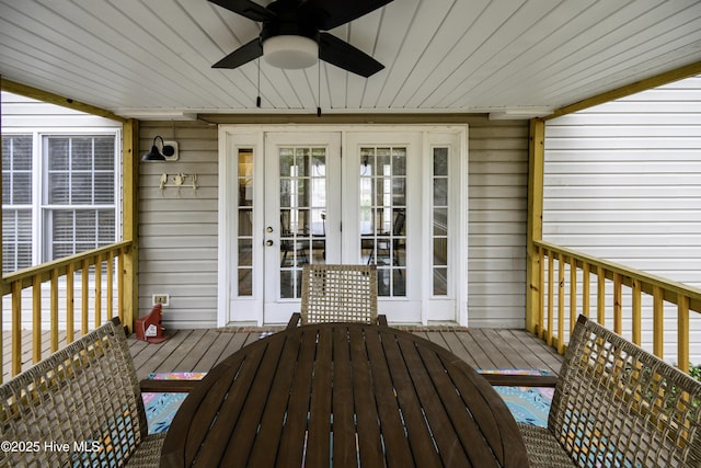 deck with ceiling fan and french doors