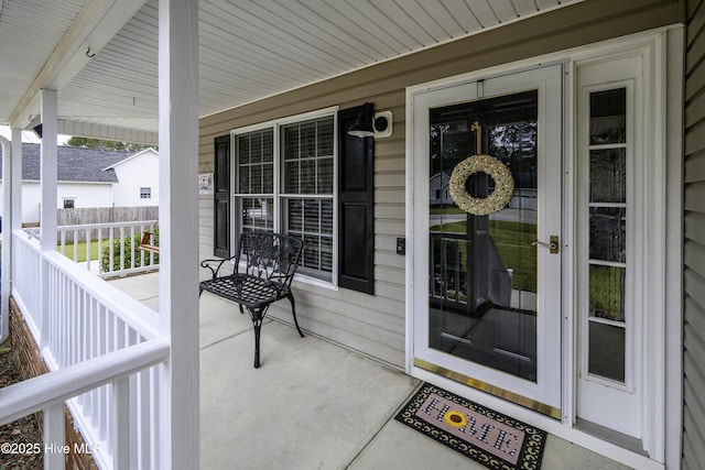 doorway to property with covered porch