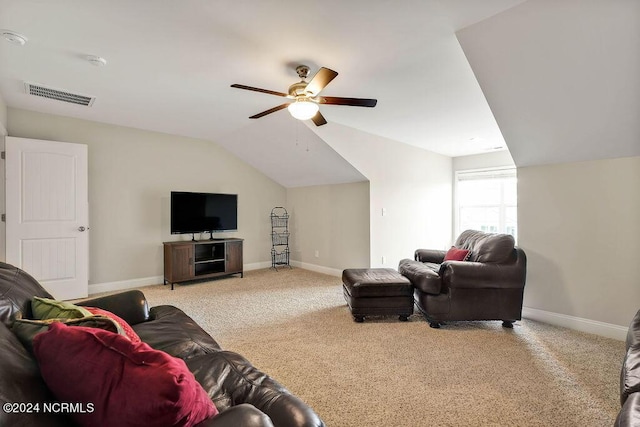 living room with carpet flooring, ceiling fan, and lofted ceiling