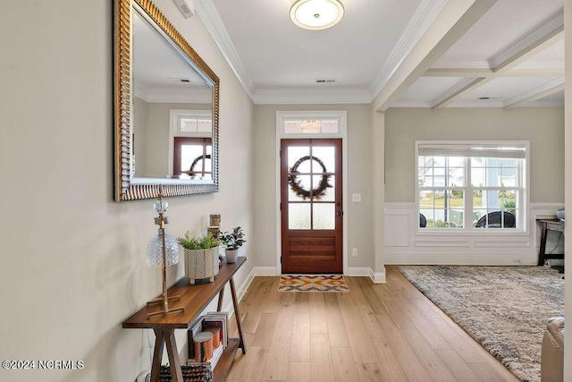 foyer with crown molding, light hardwood / wood-style flooring, beamed ceiling, and coffered ceiling