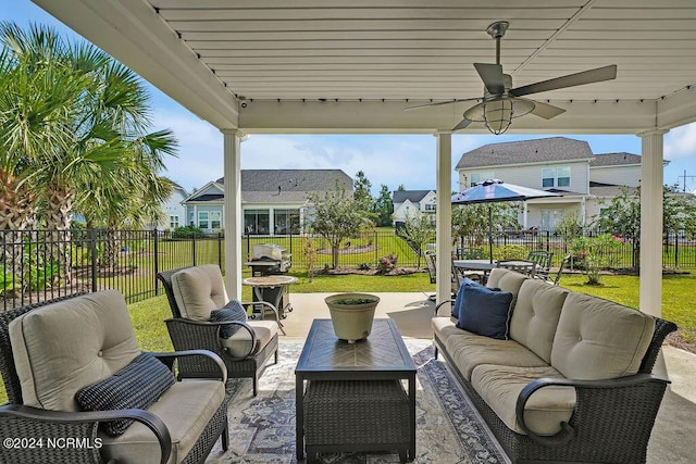 view of patio / terrace with ceiling fan and an outdoor hangout area