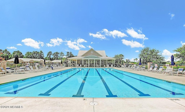 view of swimming pool featuring a patio