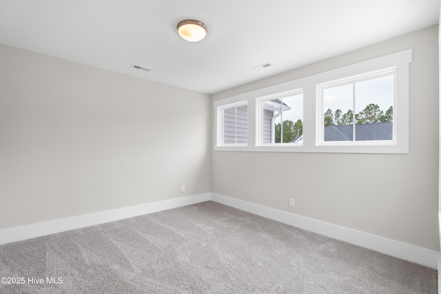 spare room with carpet flooring