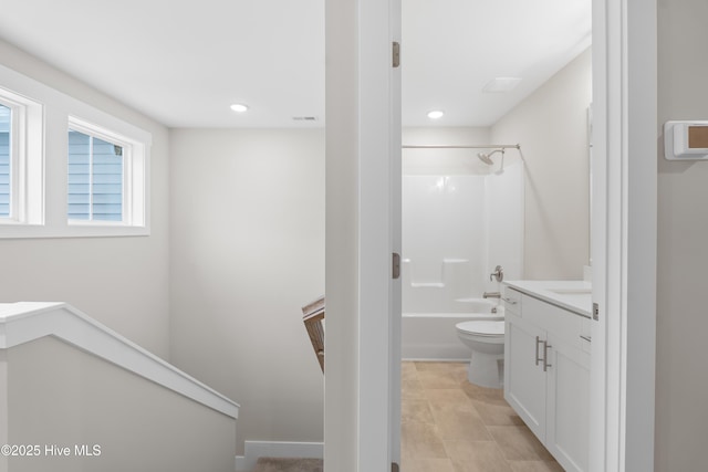 full bathroom with shower / tub combination, vanity, and toilet