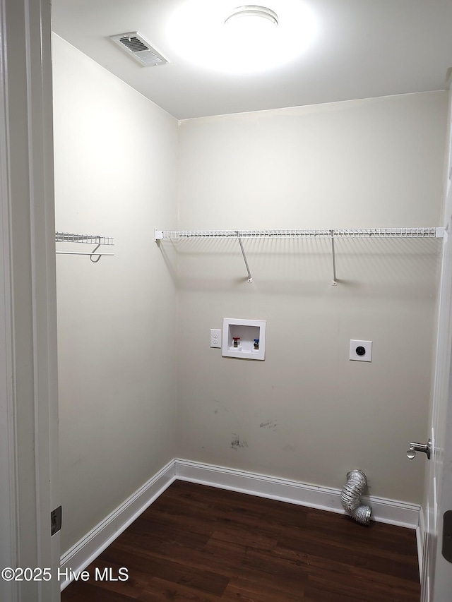 laundry area with washer hookup, dark hardwood / wood-style floors, and electric dryer hookup