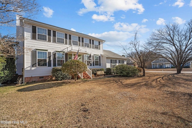 view of front facade with a front lawn