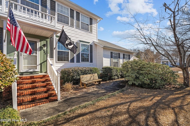 exterior space featuring a balcony