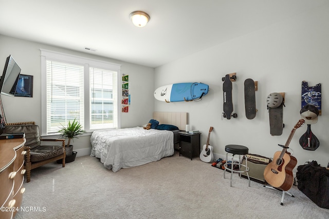 bedroom featuring carpet