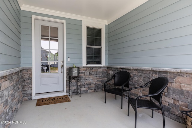 entrance to property with a porch