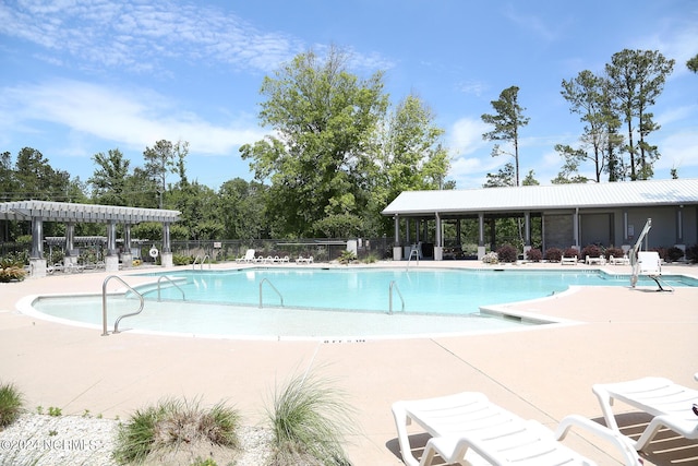 view of pool with a pergola