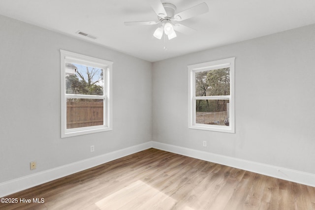 unfurnished room featuring ceiling fan and light hardwood / wood-style flooring