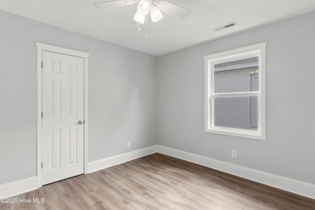 unfurnished room featuring ceiling fan and light hardwood / wood-style flooring