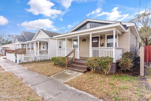 bungalow-style home featuring covered porch