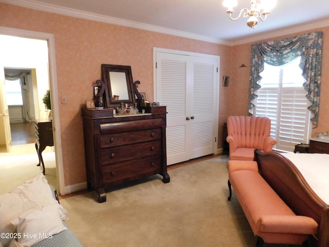 bedroom featuring a closet, light colored carpet, a chandelier, and ornamental molding