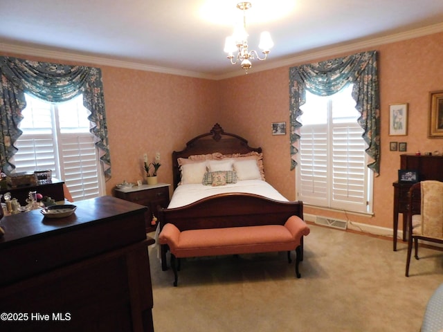 carpeted bedroom with a notable chandelier and ornamental molding