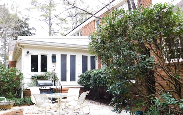 back of house with a patio area