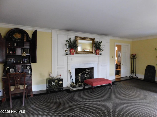 living room featuring crown molding