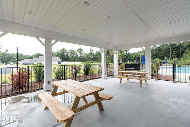 view of patio with a community pool