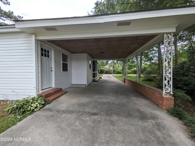 view of patio with a carport