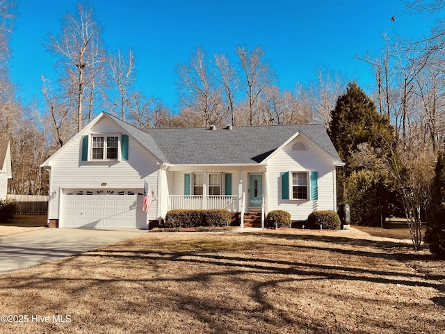 view of front of home featuring a garage and a porch