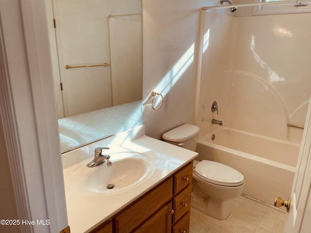 full bathroom featuring toilet, shower / bathing tub combination, and vanity