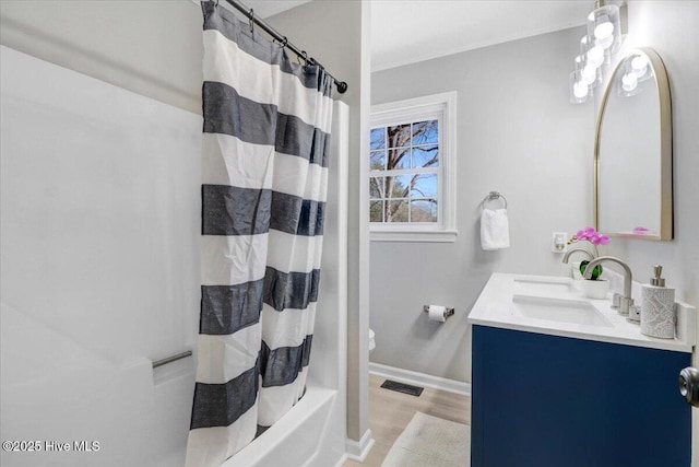 full bathroom with toilet, vanity, shower / bathtub combination with curtain, and wood-type flooring