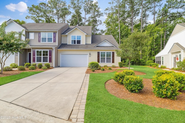 view of front facade with a garage and a front lawn