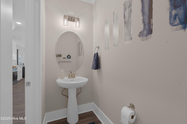 bathroom featuring hardwood / wood-style flooring