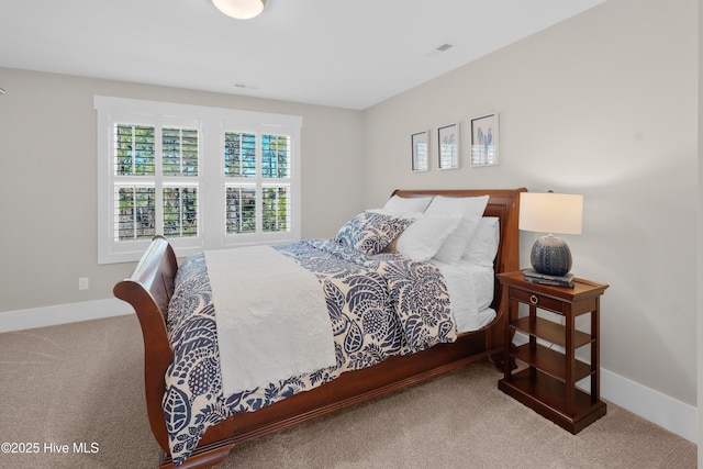 bedroom featuring carpet