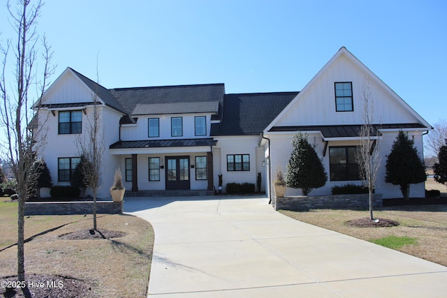 modern farmhouse with a front lawn