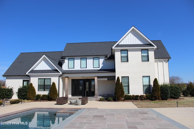 back of house featuring a patio area