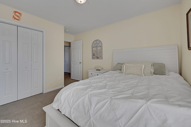 bedroom with carpet flooring and a closet