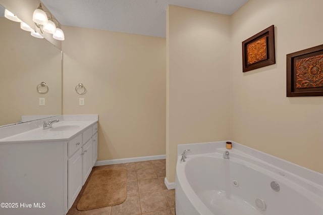 bathroom featuring a bath, vanity, and tile patterned floors