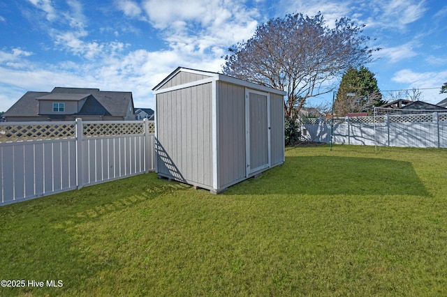 view of outbuilding featuring a yard