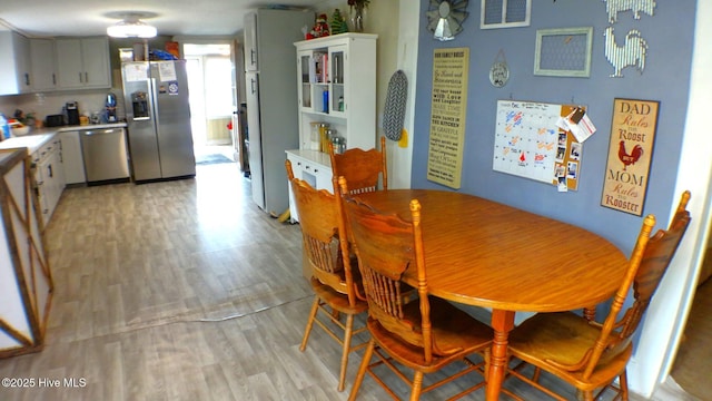 dining room featuring light wood-type flooring