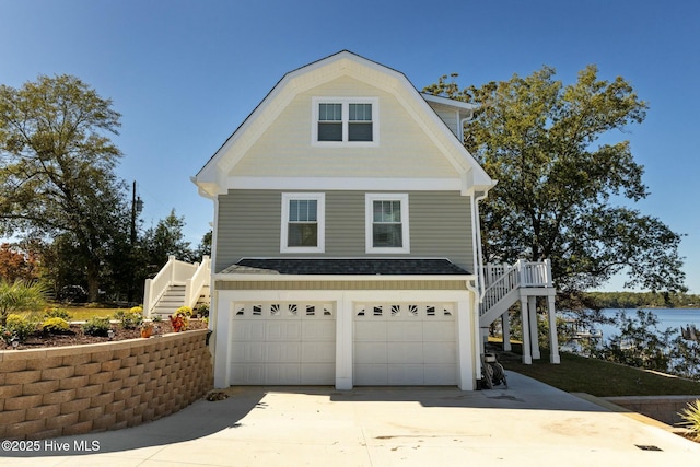 view of side of home with a garage