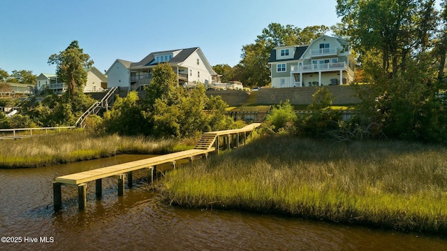 dock area with a water view