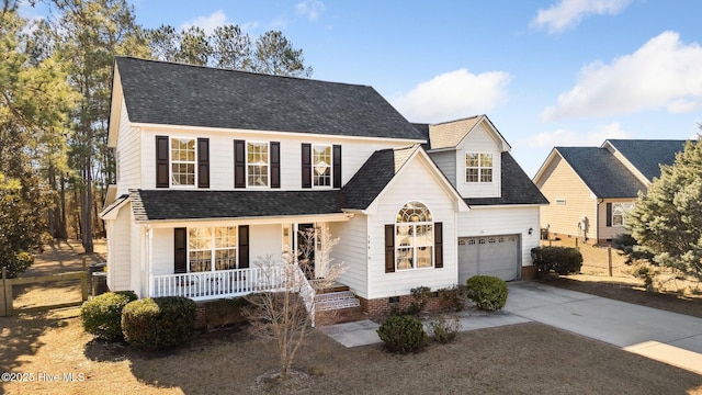 front facade featuring a garage and a porch